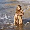 Dirty-blonde goddess, naked on the beach 17